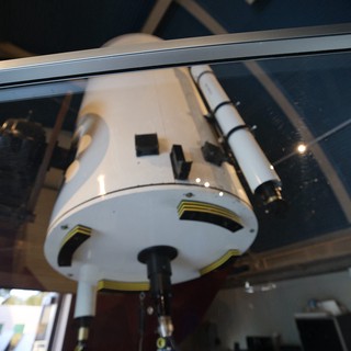 White Telescope Mount Under Observatory Dome