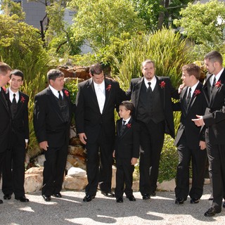 Groomsmen Share a Moment Before the Wedding Ceremony