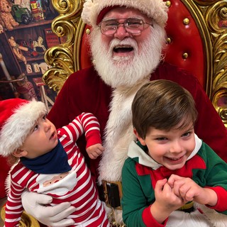 Santa Claus and Two Children on Golden Throne