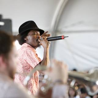 K'naan Warsame wows the crowd at Coachella 2009 with fedora and microphone