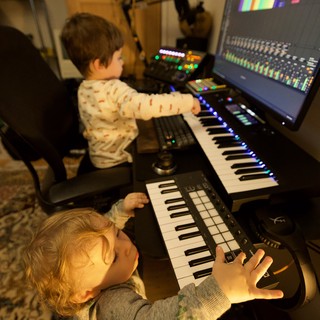 Young Children Making Music Together in Home Studio