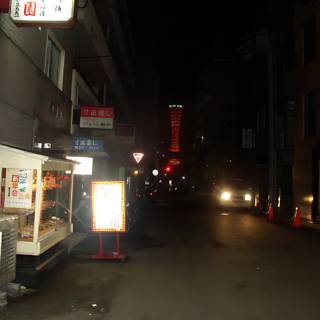 Nighttime Scene of a Busy City Street