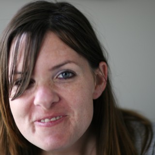 Candid Close-Up Portrait of a Smiling Woman