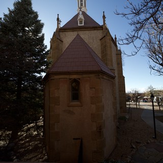 Historic Adobe Chapel with Purple Roof in Santa Fe