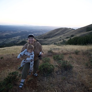 Mother and Toddler Hiking Golden Hills at Dusk