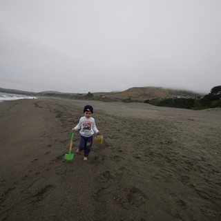 Young Explorer Walks Foggy Northern California Beach