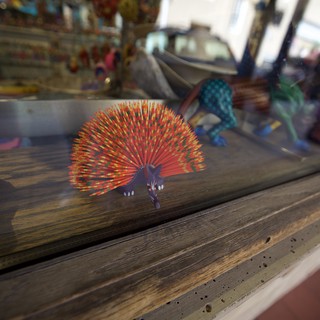 Vibrant Handcrafted Peacock Sculpture in Santa Fe Display
