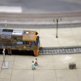 Miniature Worlds in Motion