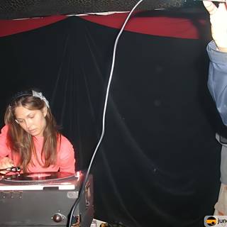 Pink Shirted DJ Entertains at Respect Club