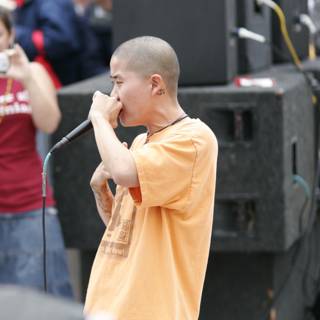 Orange-Clad Singer Wows Crowd at 2006 Student Protest