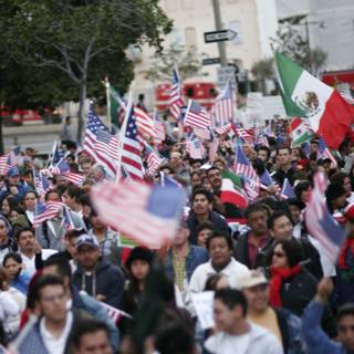 American and Mexican flags unite a diverse crowd