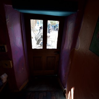 Vibrant Purple Entryway with Turquoise Ceiling in Santa Fe