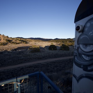 Desert Surveillance: Camera Installation at Golden Hour