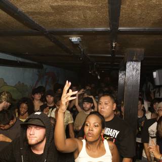 Club Scene with a Raise of the Hand