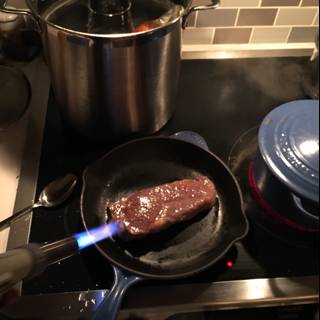 Sizzling Steak on a Cooking Pan