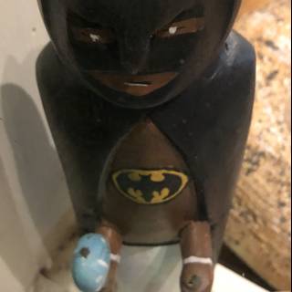 Wooden Batman with Ball Figurine