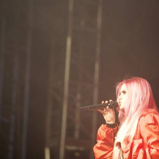 Pink-haired Woman Rocks the Stage