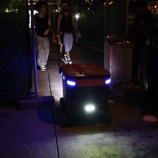 Autonomous Delivery Robot Navigates Nighttime Festival Crowd