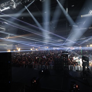 Laser Light Storm Over Massive Dance Music Crowd