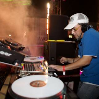 DJ Robin Schulz Spins Music in a Blue Hat