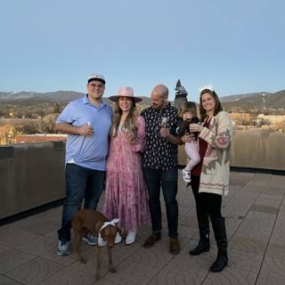 Family Portrait on Santa Fe Rooftop with Their Beloved Pup