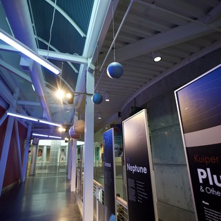 Modern Planetarium Exhibition Hall with Educational Displays