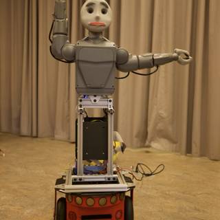Robotic Toy with Wheels and Arms