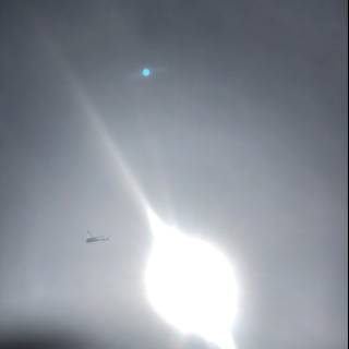 Sun Flare Above High-Flying Plane