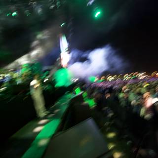Vibrant Green Lights Illuminate Energetic Crowd at 2010 Cochella Friday Concert