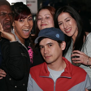 Friends Laughing Together at a Night Venue