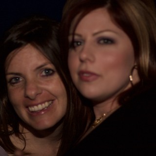 Two Women Sharing a Candid Moment Together