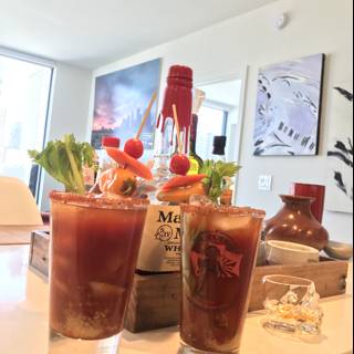 Two Glasses of Bloody Cocktails on a Desk