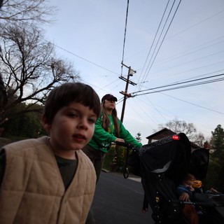 Family Evening Bike Ride on Suburban Street