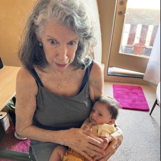 A Portrait of Love: Rhoda B Holding a Baby