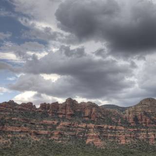 Majestic View of Sedona's Red Rocks and Clouds