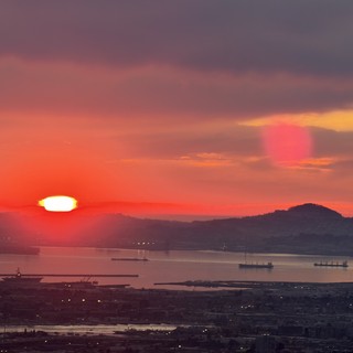 Golden Sunset Over San Francisco Bay with Cargo Ships