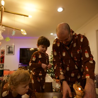 Family Christmas Morning in Matching Pajamas