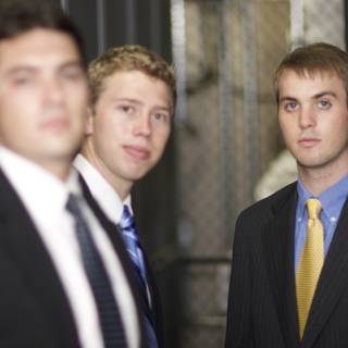Three Dapper Men in Suits