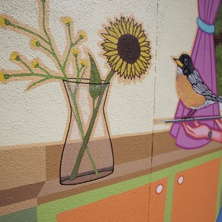Cheerful Wall Mural with Sunflowers and Bird