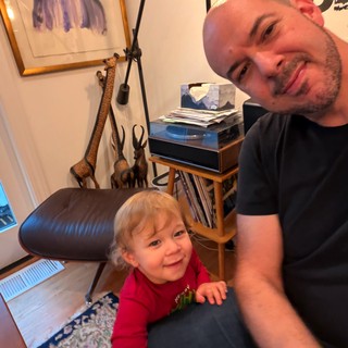 Father and Toddler Working from Home Together