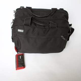 Sleek Black Backpack with Striking Red Straps