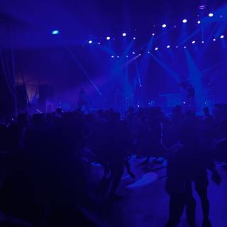 Blue-Lit Concert Crowd at Empire Polo Club