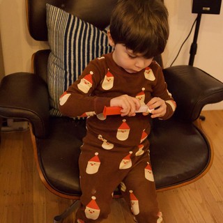 Young Child Playing with Toys on Christmas Day