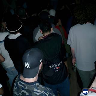 Nightclub Crowd in Baseball Caps
