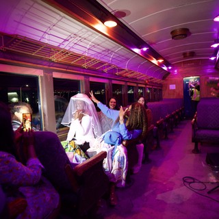 Bride Celebration on Vintage Purple-Lit Train Car