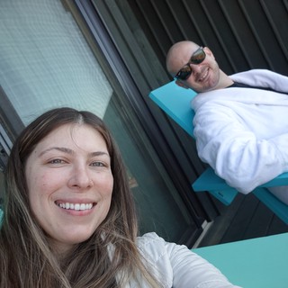 Couple Celebrating with Champagne by Pool