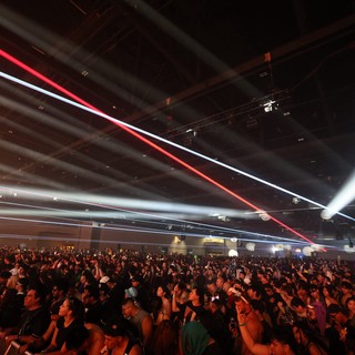 Laser Light Storm Over Massive Festival Crowd