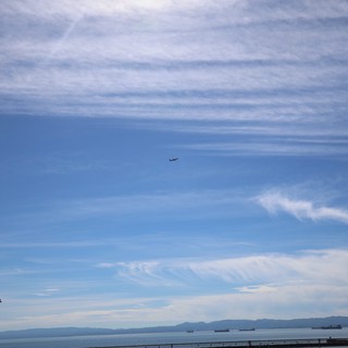 Aircraft Departing Over Bay at Dusk from USS Hornet