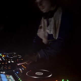 DJ Performing with Pioneer CDJ Controller Setup in London