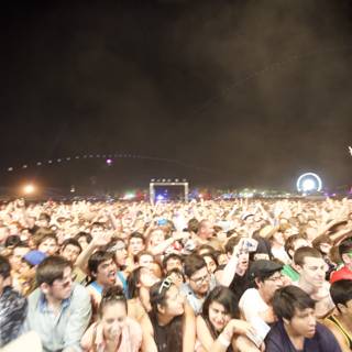 Under the Night Sky: 31 People Enjoying a Concert at Coachella Music Festival